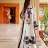 Model styling Shan-e-Zar: White Elegance Unleashed in full outfit with accessories, from Saanah traditional clothing collection.