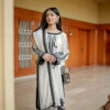 Model in Shan-e-Zar: White Elegance Unleashed, styled for a festive look with white traditional dress, from Saanah collection.