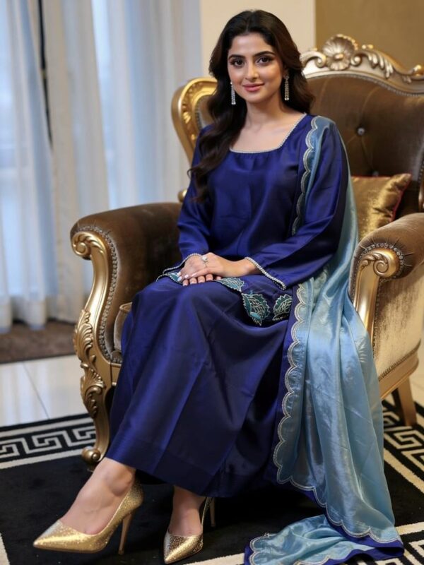 Front view of royal blue kurta with embroidered daman and silk dupatta.